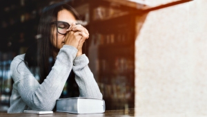 WEB3 WOMAN PRAYING CAFE COFFEE SHOP SCRIPTURE Shutterstock